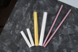 Chemically inert colored zirconia ceramic rods for corrosive environment applications in chemical processing