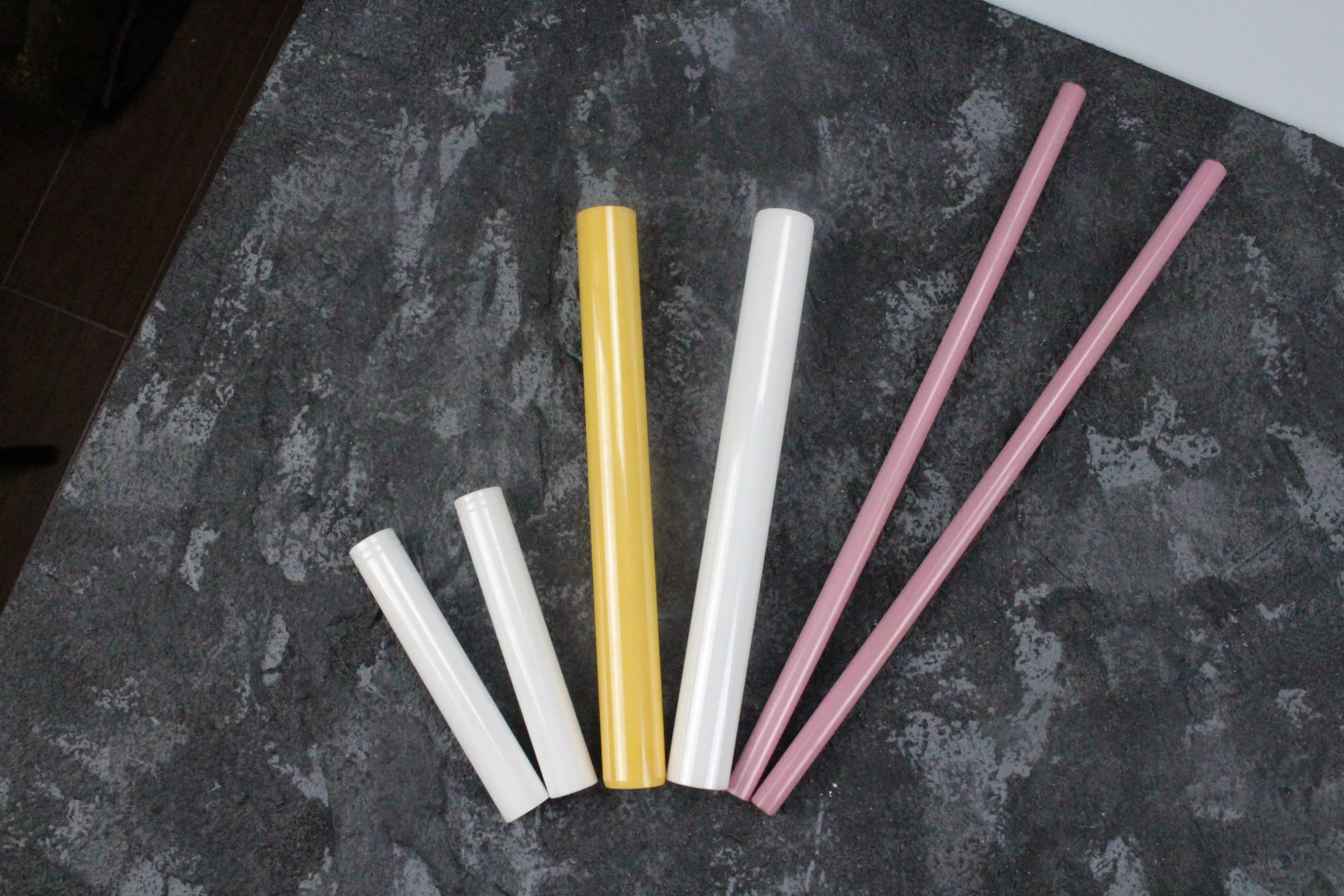 Chemically inert colored zirconia ceramic rods for corrosive environment applications in chemical processing